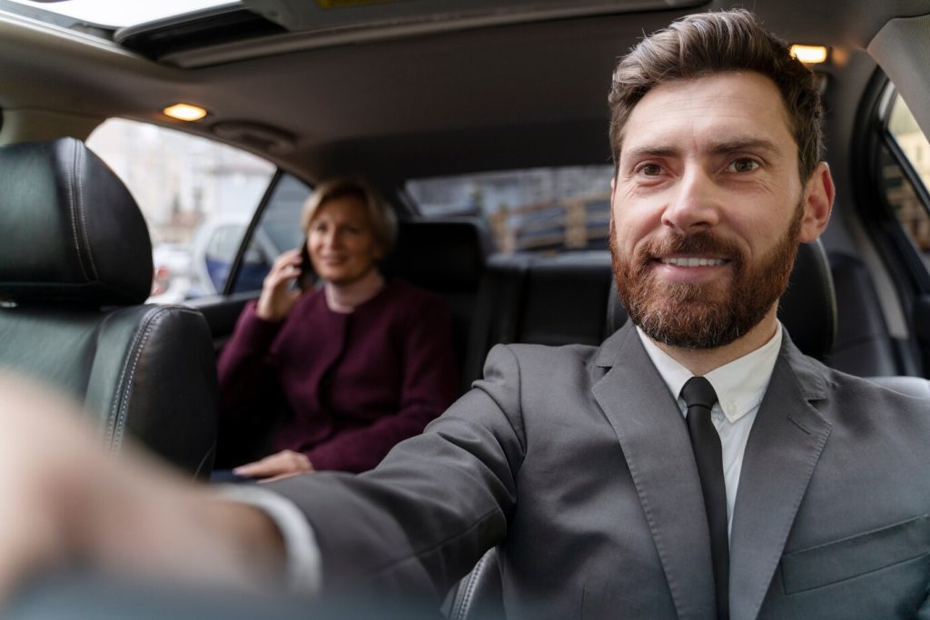 taxi-driver-female-client-interacting-formal-way_23-2149204538